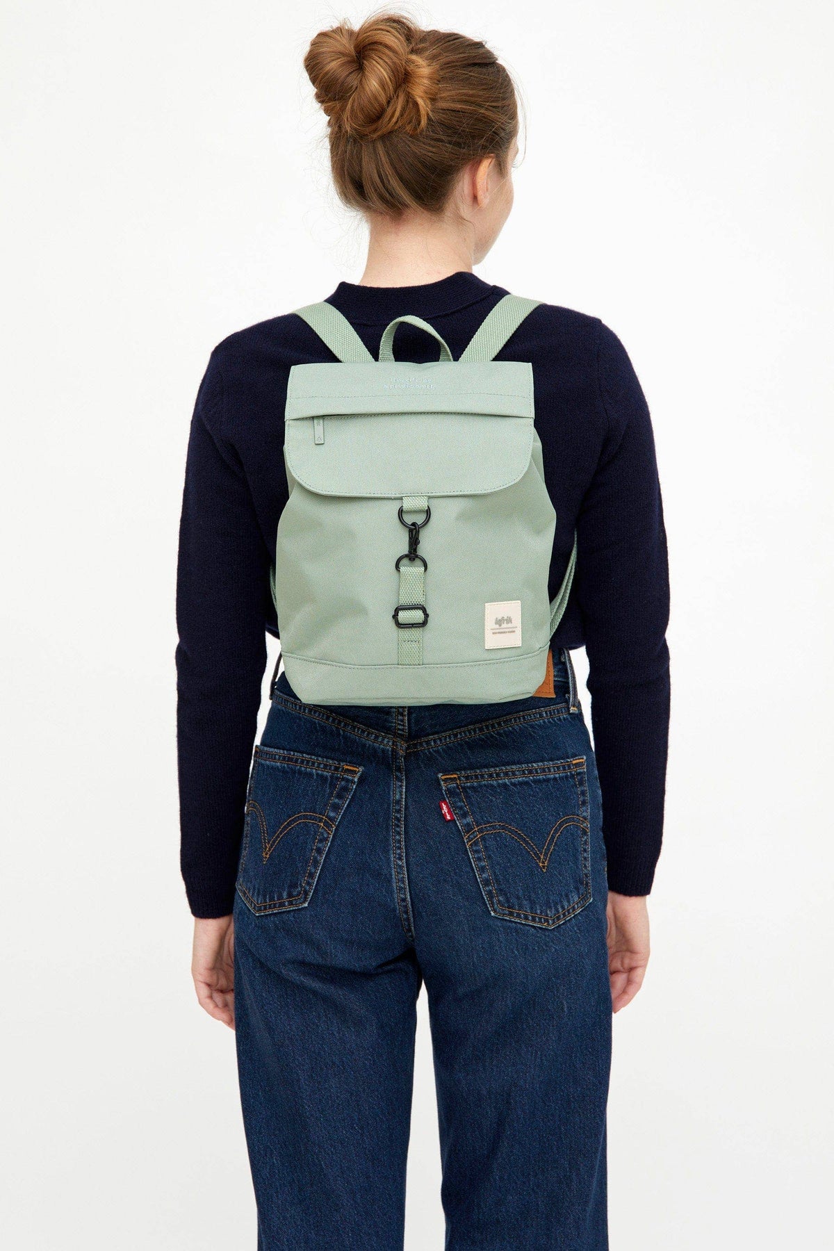 Scout Mini Backpack – lightweight, water-resistant, and eco-friendly bag made from OXFORD RPET fabric. Features adjustable cotton straps, a spacious main compartment, a quick-access flap pocket, and a hidden security pocket. Perfect for everyday use, school, or travel.