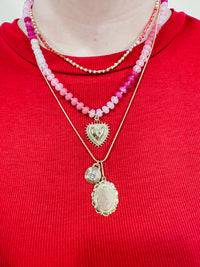 Layered Beaded and Pendant Necklace Set with Gold Accents – Heart and Charm Detail