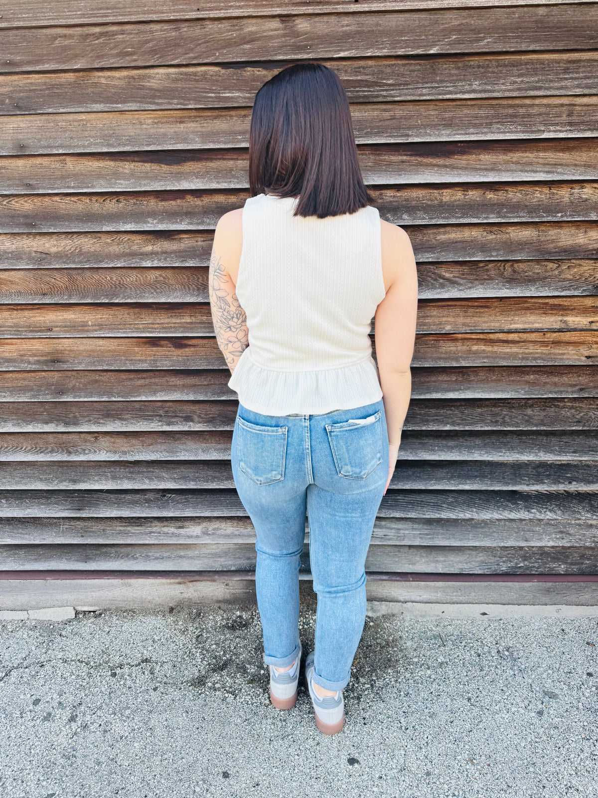 Chic Cream Tank Top with Black Satin Bow Accents