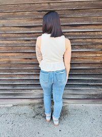 Chic Cream Tank Top with Black Satin Bow Accents