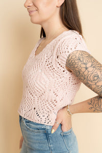 Pink knit crochet short sleeve sweater paired with denim shorts for a cute summer casual outfit
