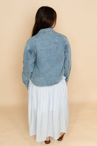 Back of medium wash denim jacket for women