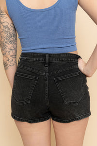 Back view of black denim shorts for women