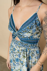 Closeup of Blue floral maxi dress.