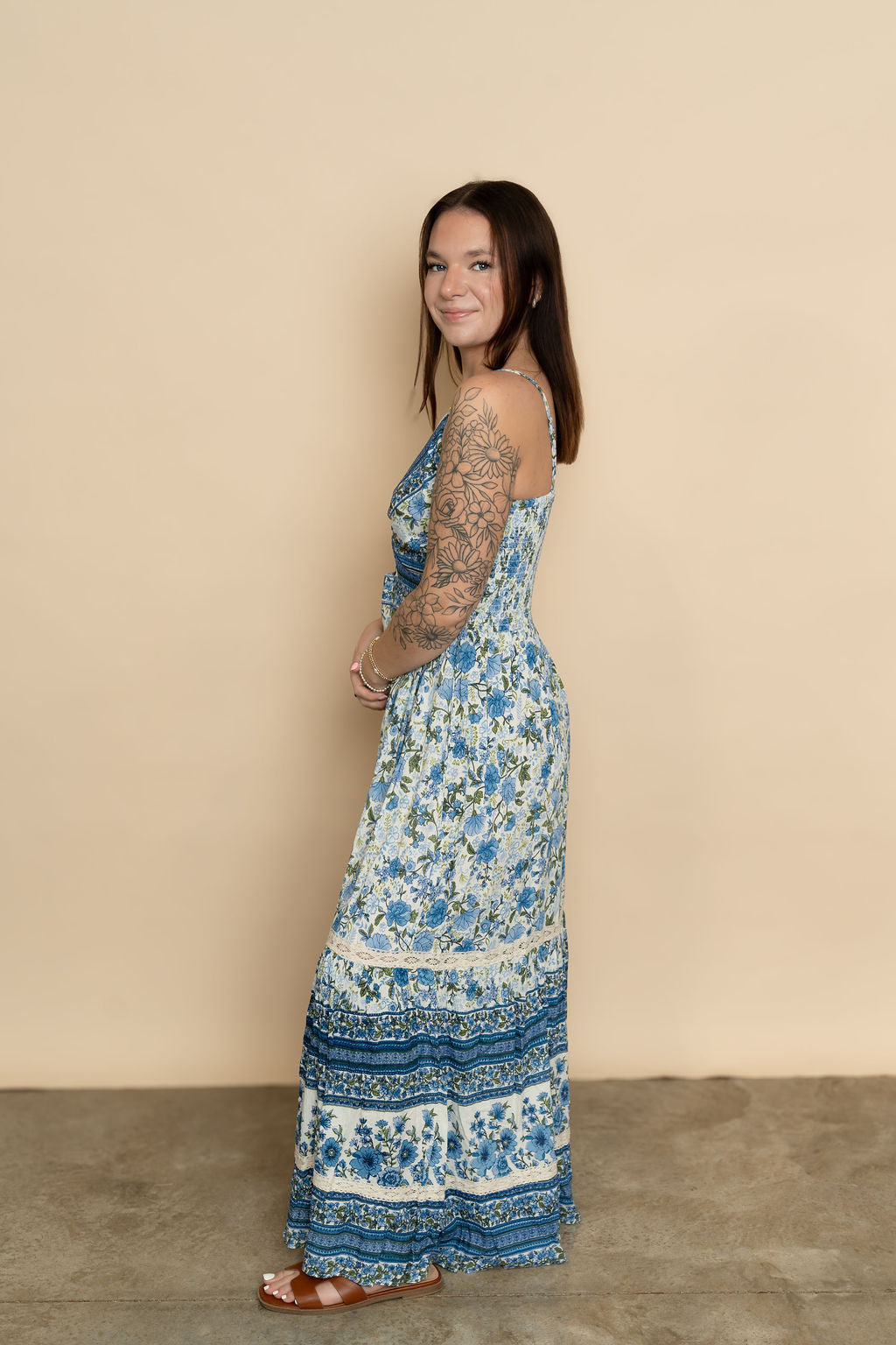 Side view of blue floral maxi dress