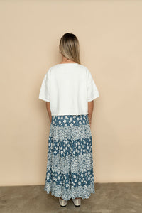 Back view of blue floral maxi skirt. 
