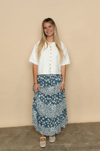 Blue floral maxi skirt styled with a short sleeve cardigan for an easy spring outfit. 