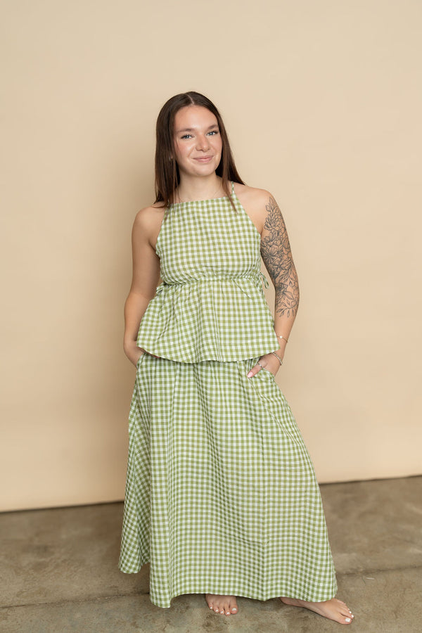 Sage green gingham baby doll tank top paired with matching sage gingham maxi skirt for a cute easy easter outfit for women. 