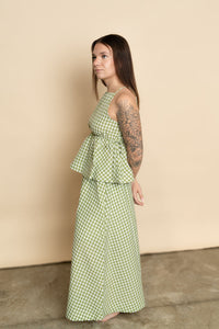 Side view of sage green gingham maxi skirt paired with matching sage gingham tank top for a cute casual set for women. 