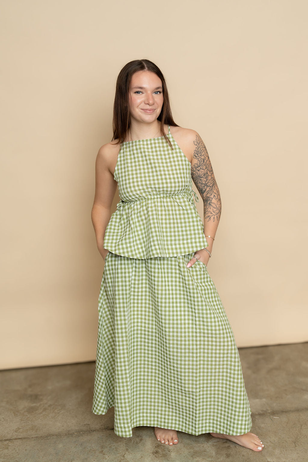 Sage green gingham print maxi skirt pair with matching sage green gingham tank top for a cute casual outfit for spring for women. 