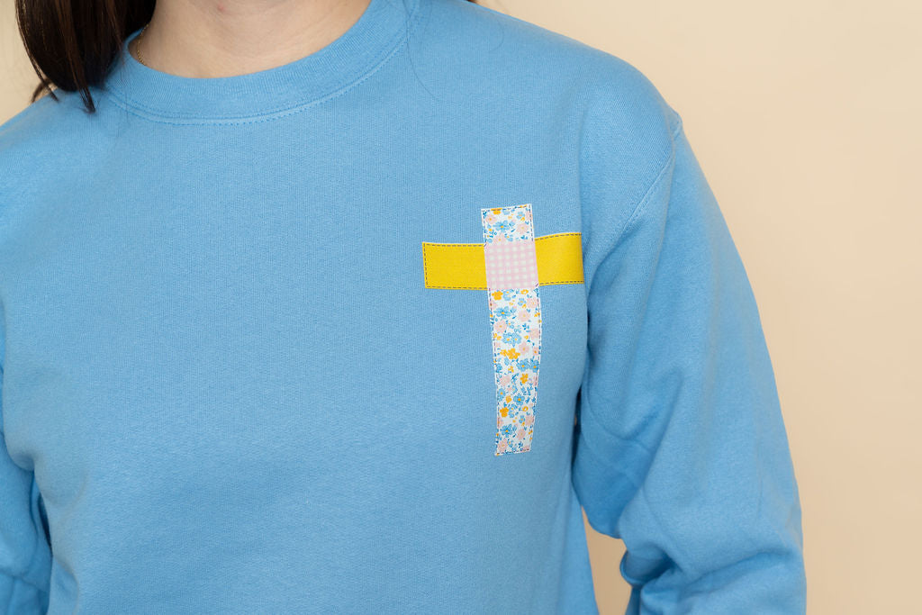 Blue He is Risen Faith Graphic Sweatshirt for casual everyday style. 