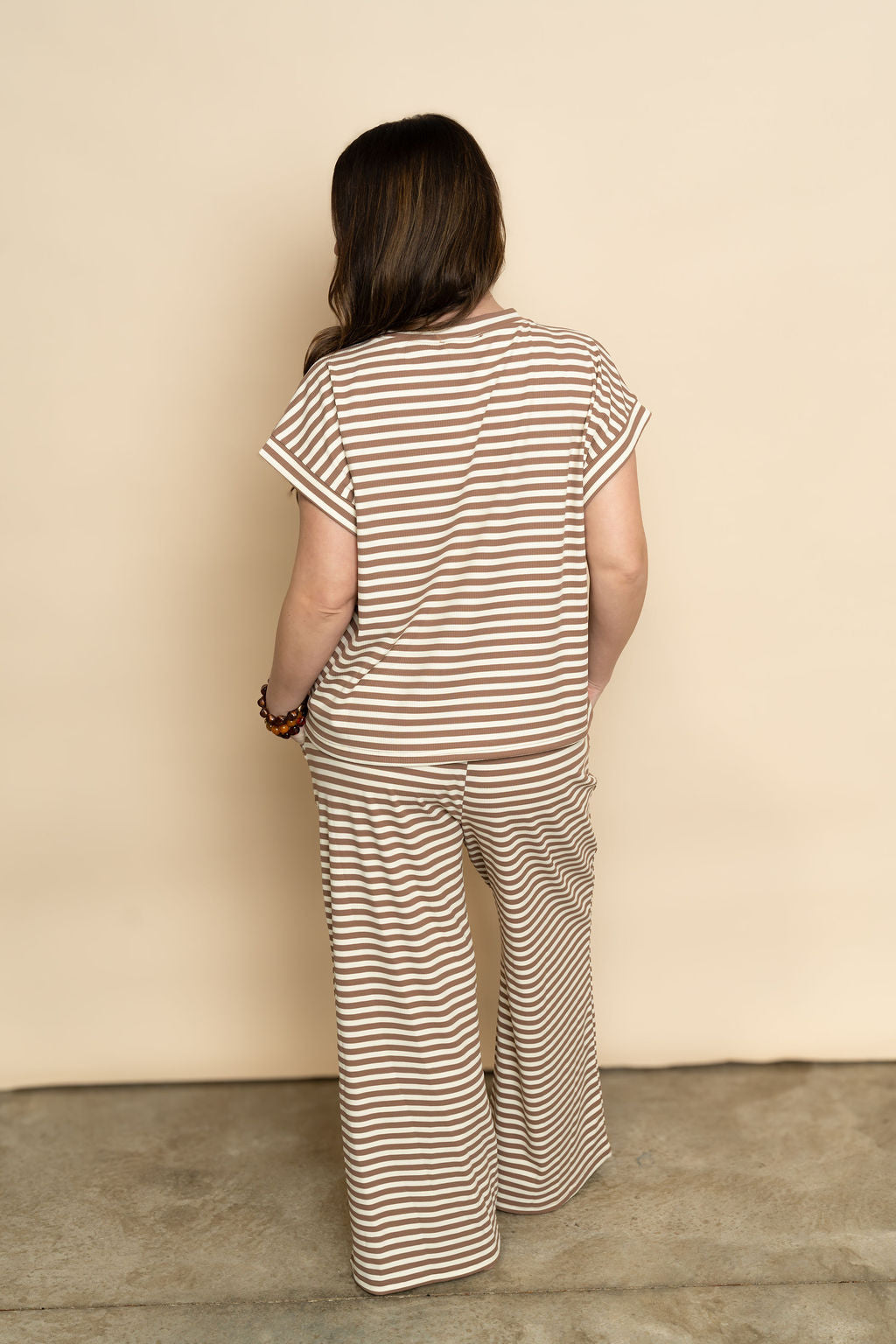 Back of brown and cream striped lounge set for women's comfortable casual outfit. 