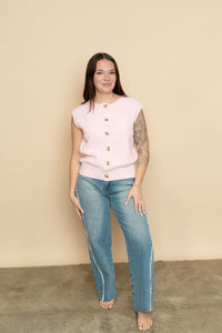 Pink ribbed knit sweater vest perfect for a casual spring outfit. 