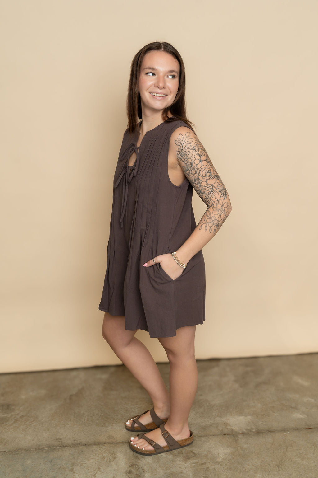 Mocha brown pleated shorts romper for women. 