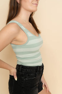 Side view of sage light green seamless padded cami tank top for women