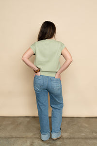 Back view of sage green knit short sleeve cardigan sweater for women. 