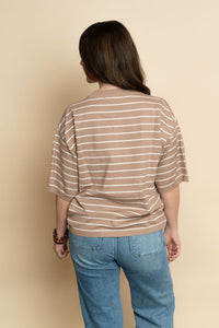 Back view of short sleeve knit striped sweater top in brown. 