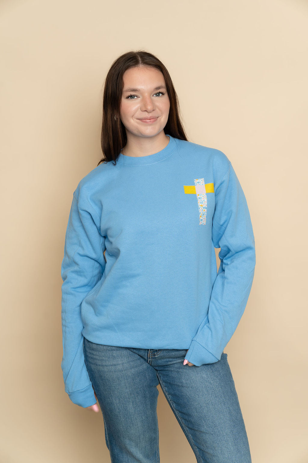 Blue He is Risen graphic sweatshirt in blue from Wild Lavender Boutique. 