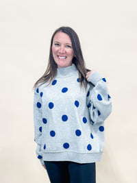 Heather Gray reversible worship and polka dot mock neck sweatshirt. 