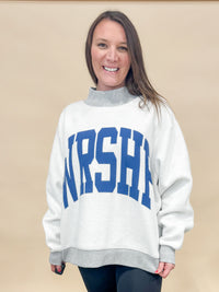 Heather gray worship and polka dot reversible mock neck sweatshirt. 