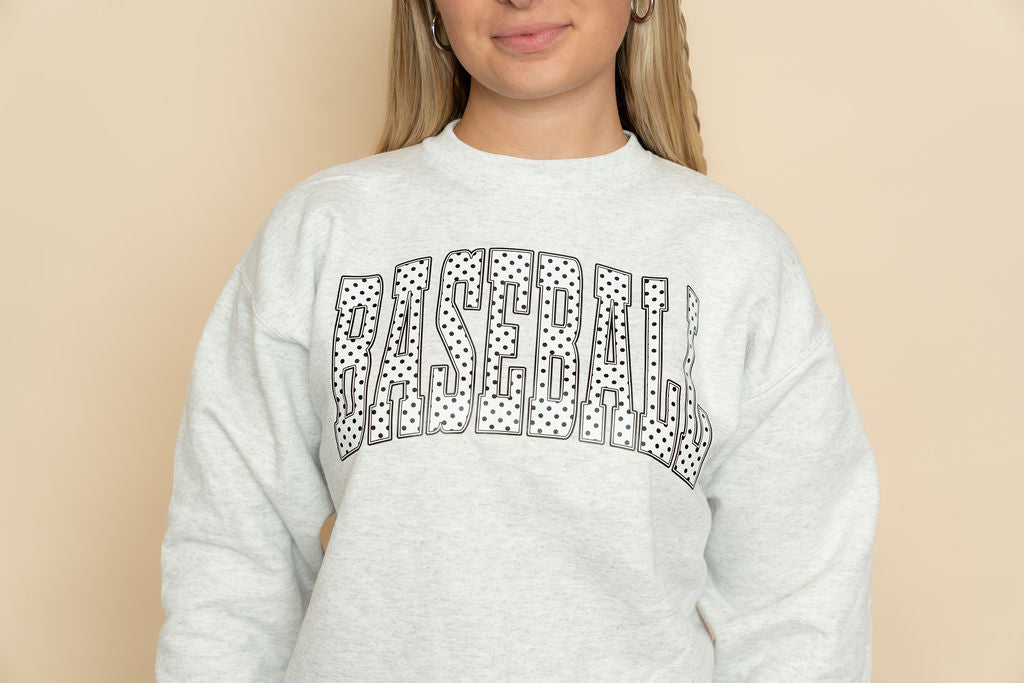 Heather Gray baseball graphic sweatshirt polka dot design, casual boutique t-shirt for everyday style. 