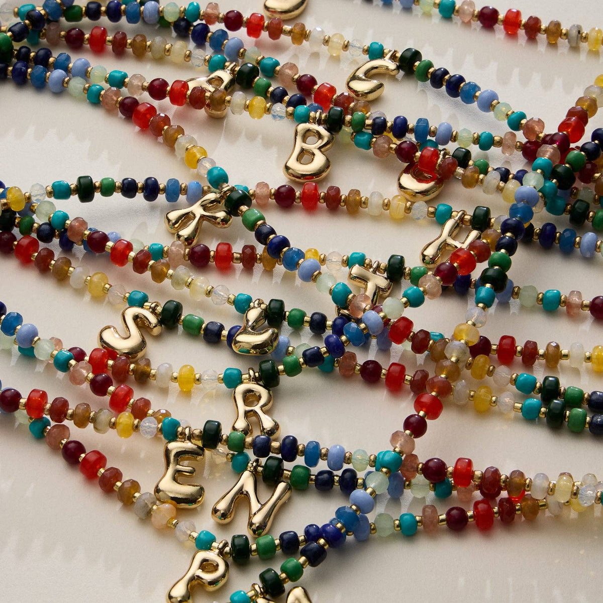 Vibrant Beaded Necklaces with Gold Initial Charms